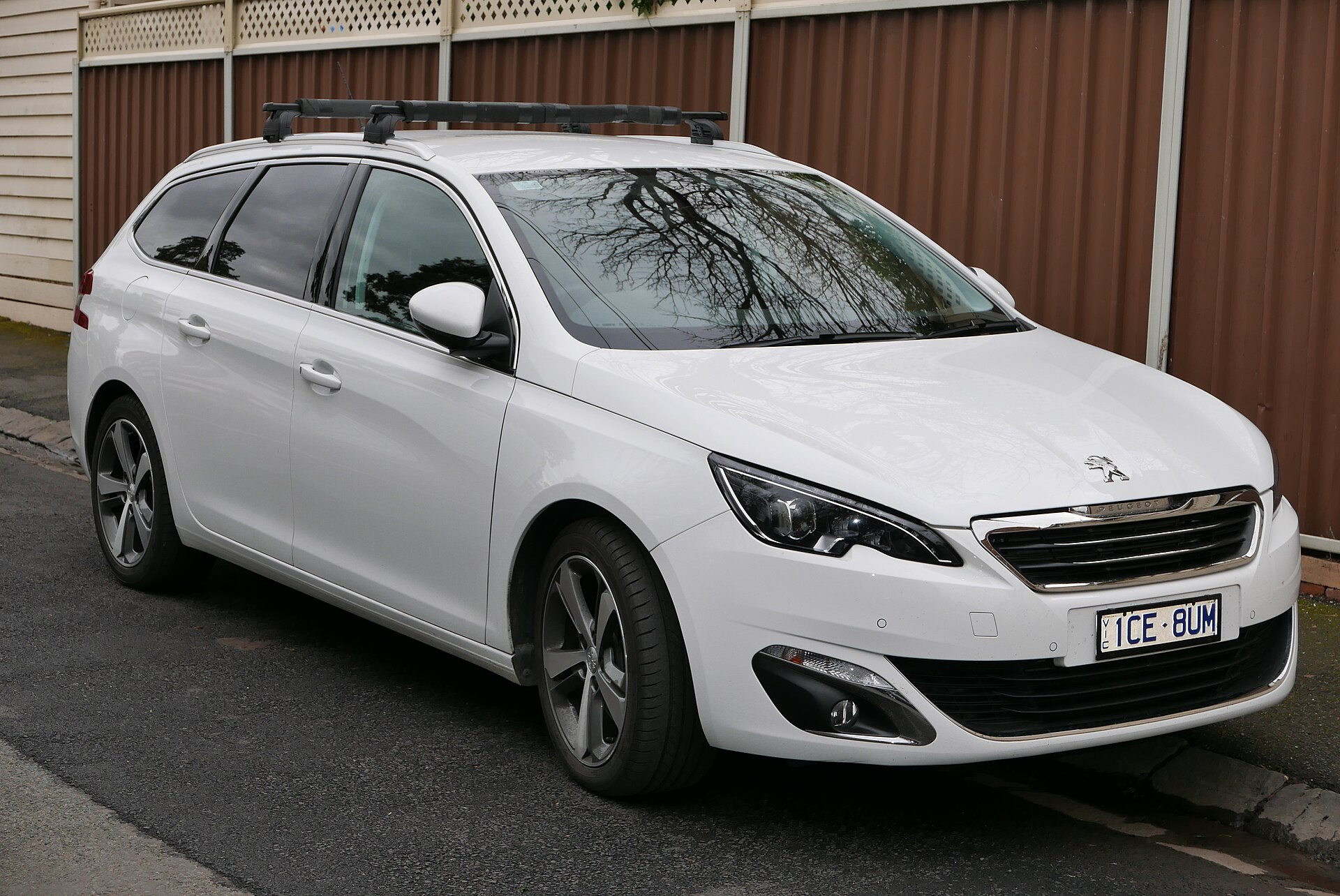2014 Peugeot 308 (T9) Allure Touring station wagon. Photographed in Alphington, Victoria , Australia.